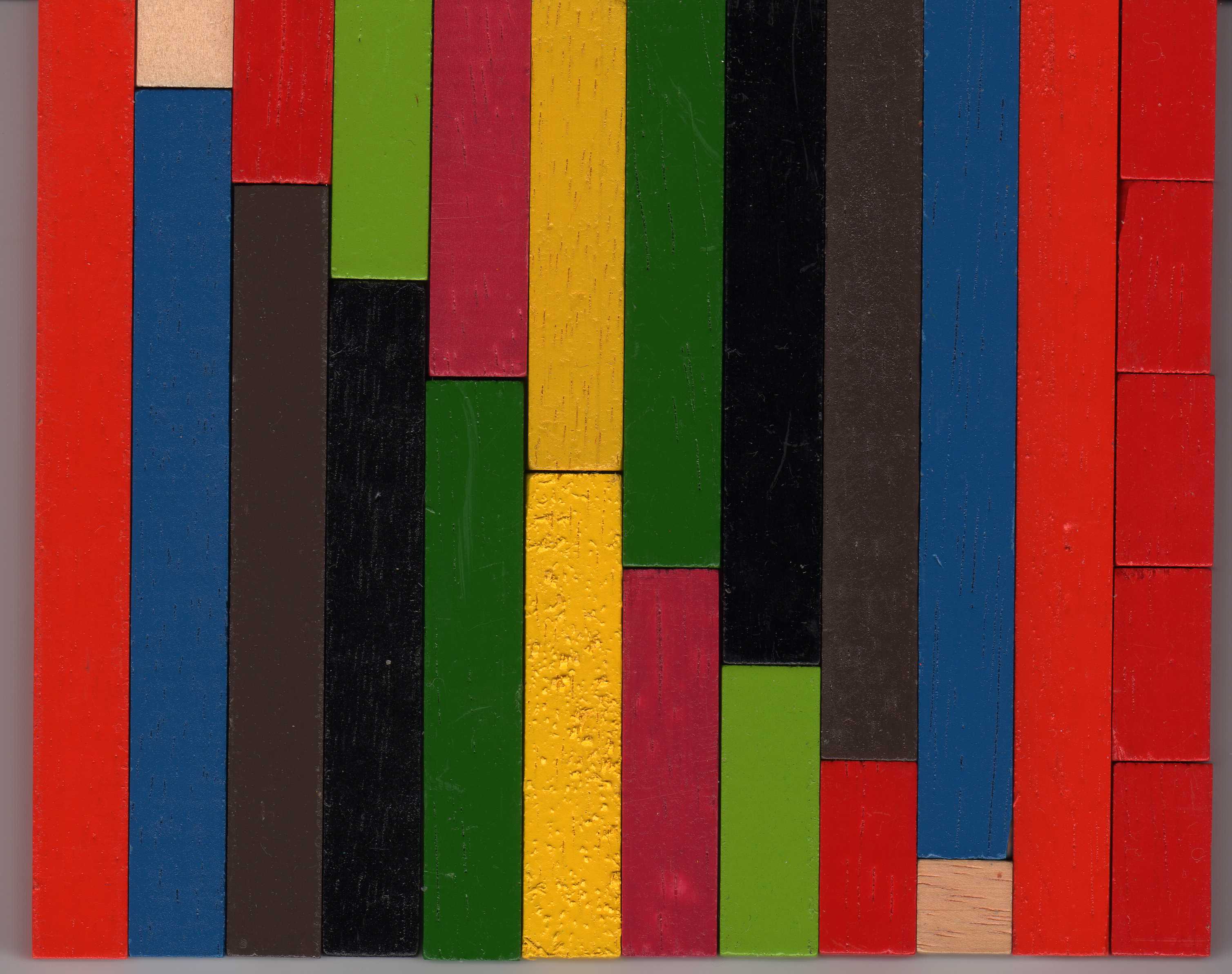 Regletas Cuisenaire de madera de distintos colores y longitudes.